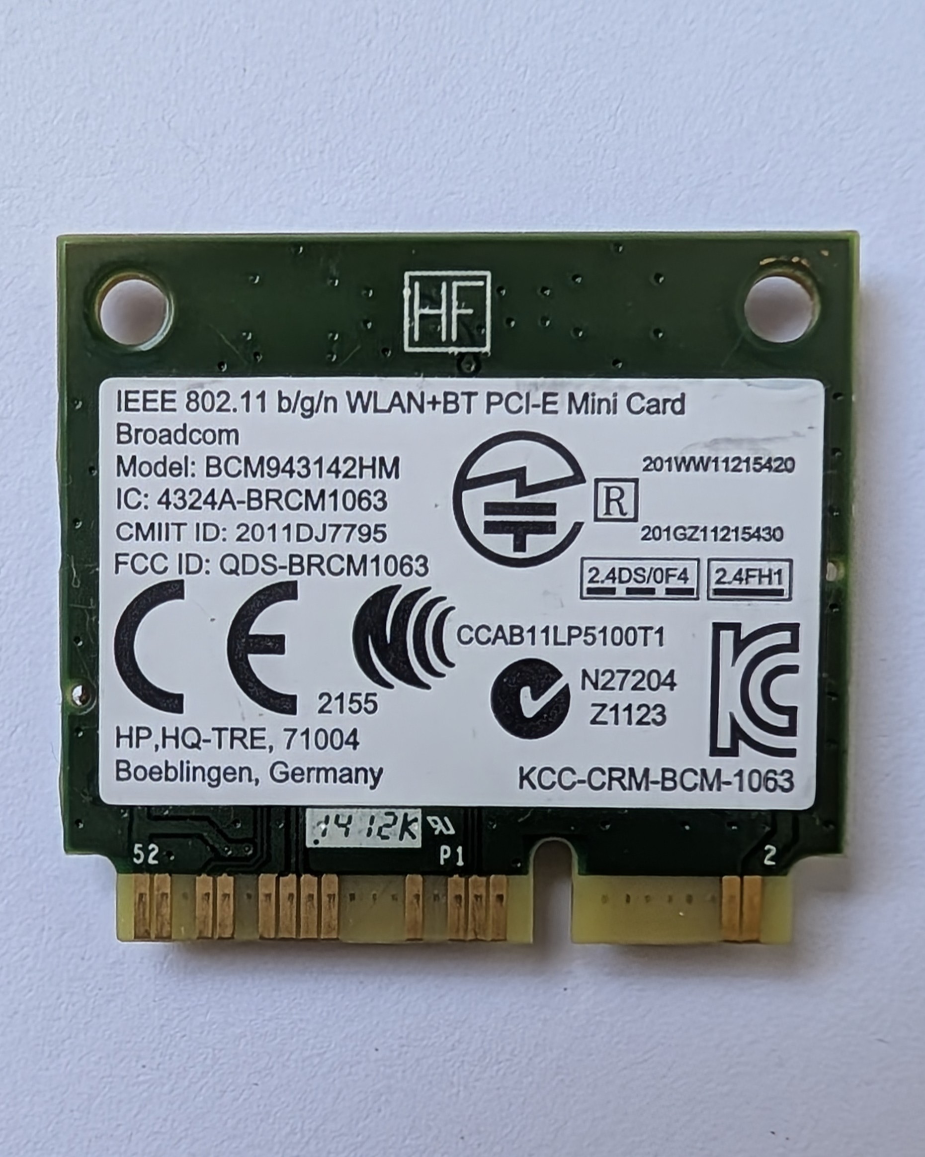 Carte Wi-Fi et Bluetooth Broadcom BCM943142HM HP Mini PCIe vue de face avec étiquette de références